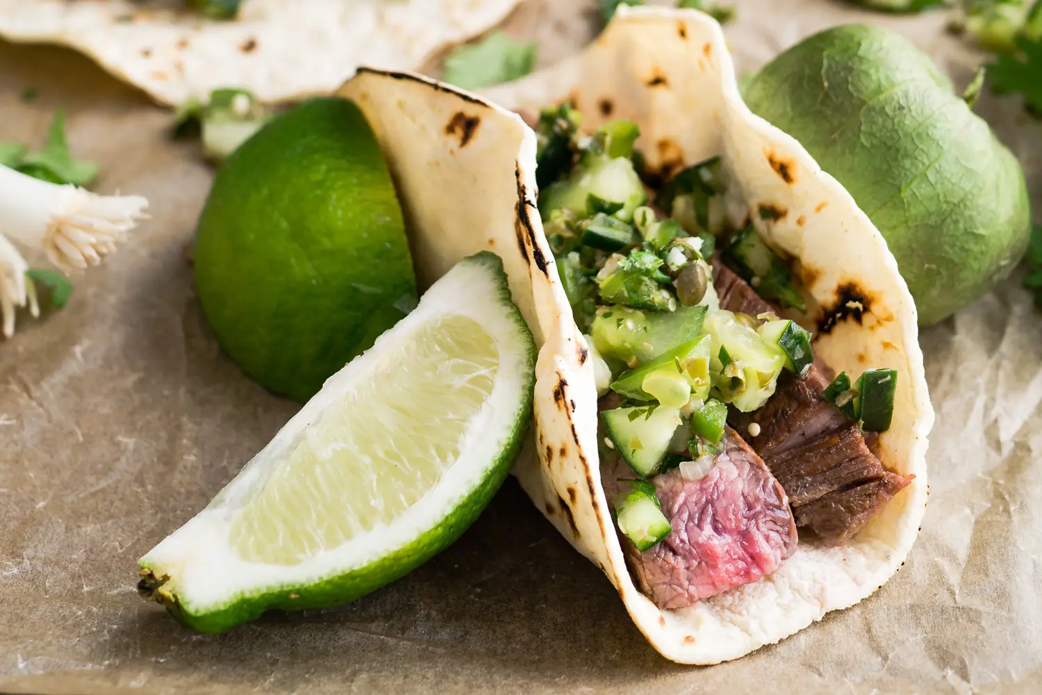 Steak Taco with Limes Beside It