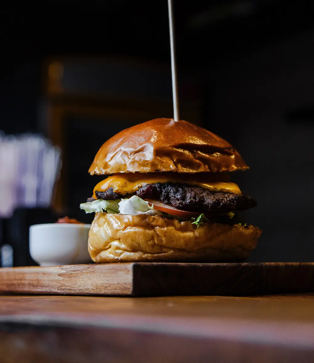 Delicious Grilled Cheese Burger with Skewer through the top